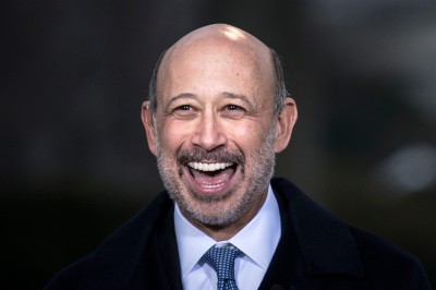 Lloyd Blankfein, Chairman and CEO of Goldman Sachs Group, laughs during an interview after a meeting with other business leaders at the White House on February 5, 2013 in Washington. Obama met with business and labor leaders to discuss immigration reform.   AFP PHOTO/Brendan SMIALOWSKI        (Photo credit should read BRENDAN SMIALOWSKI/AFP/Getty Images)